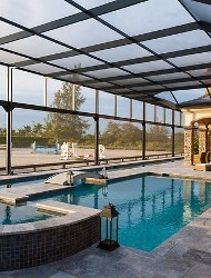 Pool Enclosure with Attached Hot Tub